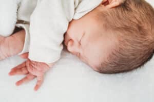 sleeping baby girl during newborn photo shoot